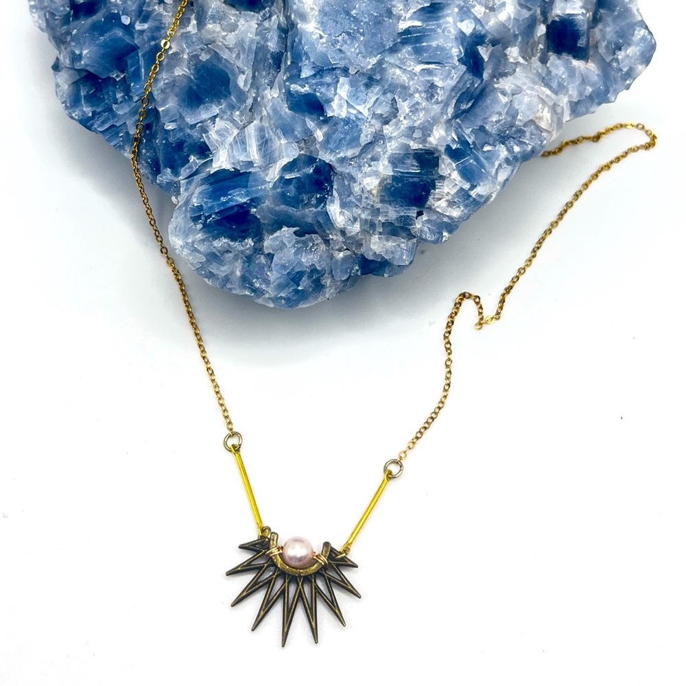 Pearl sunburst pendant necklace
